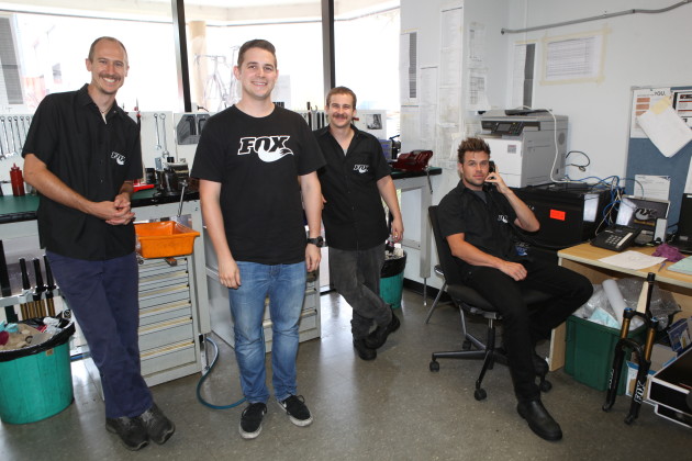 From left to right Mark Bakovic, Simon Glanville, Michael Sayer and Gavin Wall in the Fox service centre at SOLA’s headquarters in Sydney. Yes! Gavin really was on the phone when this photo was taken, waiting on hold forever, as his expression suggests.